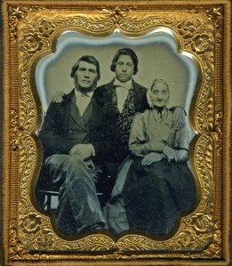 John and Anna Maria "Mary" Schutt Lantz and their son, John Peter Lantz (the author's great-grandfather, on the occasion of John Peter's 16th birthday. Mary, seven years her husband's senior, lost her teeth early, making her appear even older than she is.