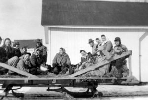 An old-fashioned hayride at the Matiles' place about 1950 on my father's bobsled. This one seems to mostly have involved relatives. The author is in the left foreground.