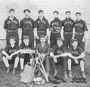 Abner Updike, center, with the Oswego Pirates community baseball team about 1900.
