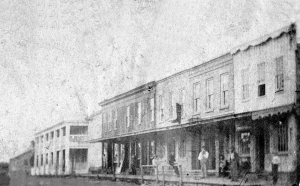This poor quality photograph is the only image we have of the east side of Main between Washington and Jackson Street we have, but it clearly shows the majestic National Hotel, along with the wood frame commercial buildings that made up the heart of downtown Oswego before the devastating fire of Feb. 9, 1867.