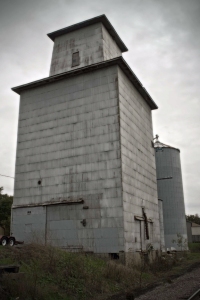 The Oswego grain elevator, now long out of use, was similar in design to hundreds of such structures across the Midwest, was the destination for crops harvested by nearby farmers since its construction in 1914.