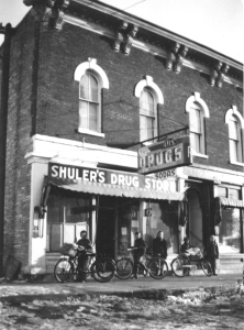 Shuler's Drug Store in Oswego as it looked to us in the mid-1950s. The door to Toy Heaven up on the second floor is visible at right. (Little White School Museum photo)