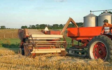 1950 tractor-pulled combine